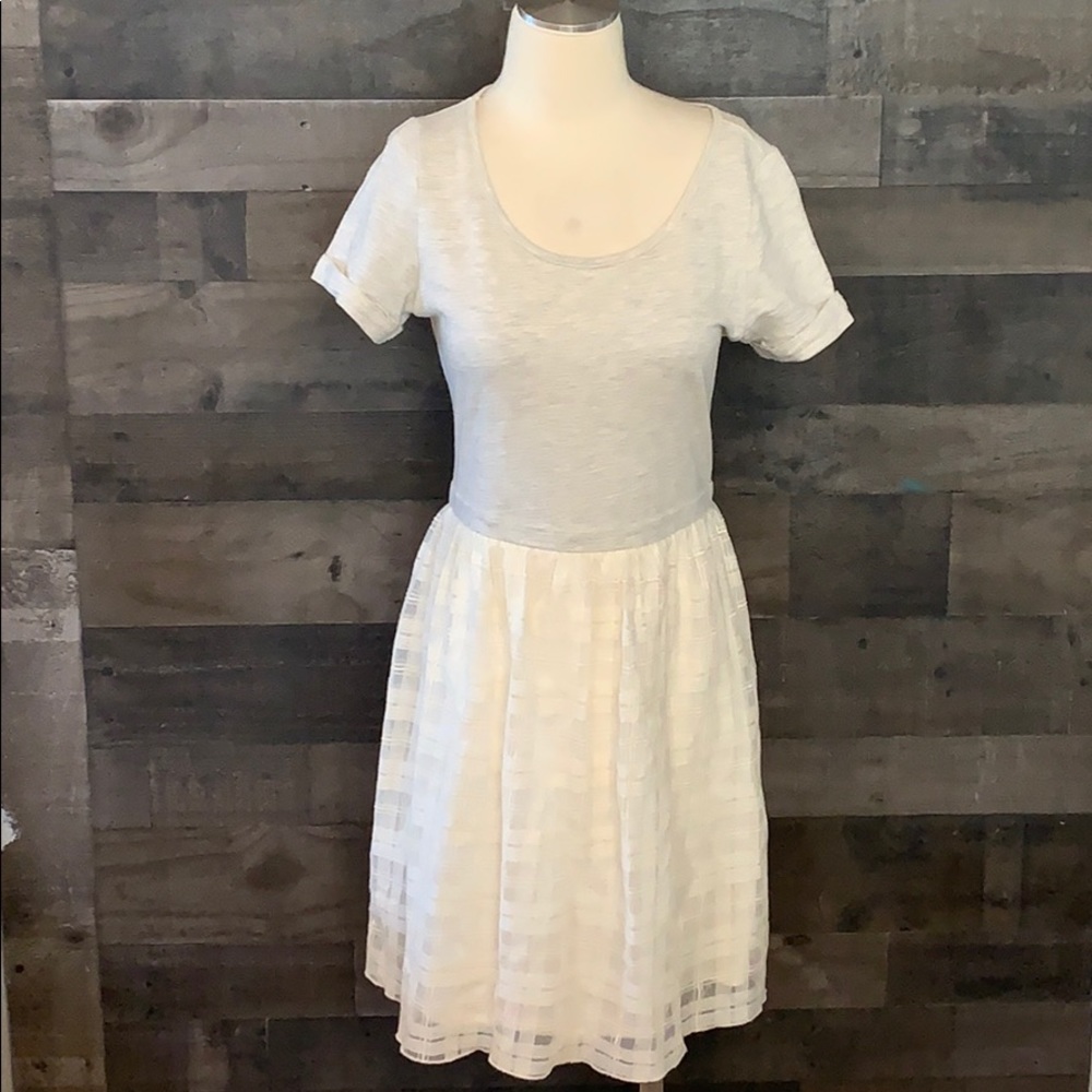 Cream Anthropologie’s Everleigh Dress